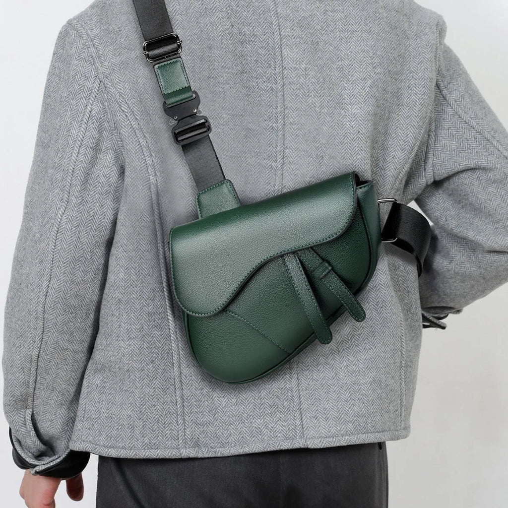 Unisex saddle shoulder crossbody chest bag in black synthetic leather with stitching and splicing details