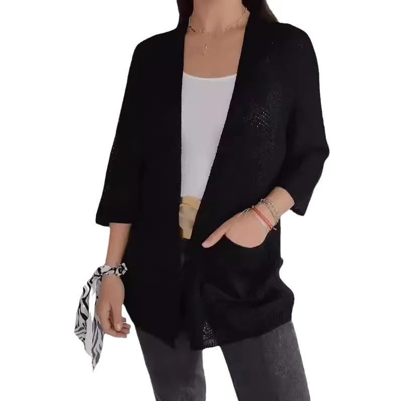 Women's waffle-textured cardigan coat in army green with nine-quarter sleeves and front pockets.