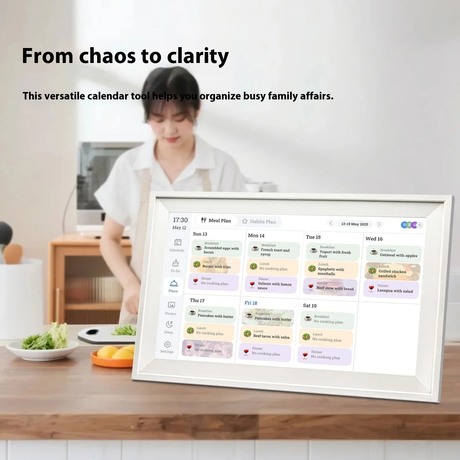 White 15.6 inch smart digital photo frame with app connectivity on wooden surface