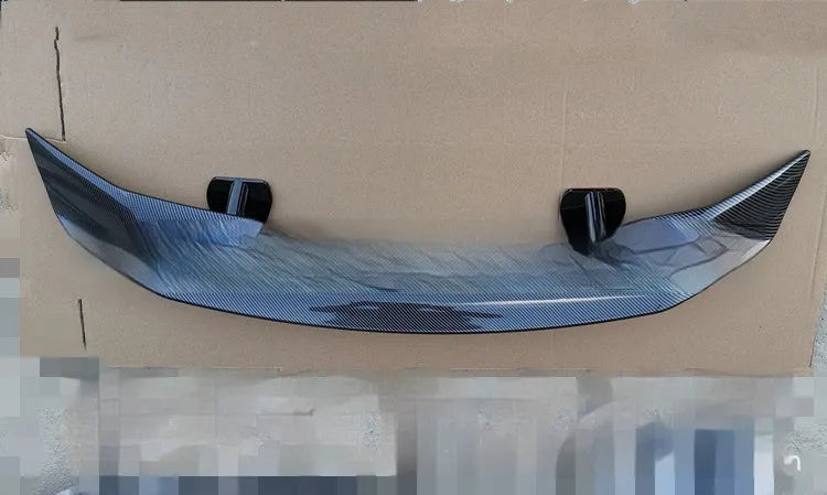 Universal punch-free fixed air design car spoiler tail wing in ABS plastic shown in various finish options.