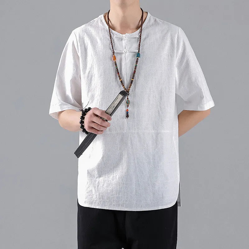 Men's round neck linen T-shirt with jacquard fastener decoration in a loose fit.