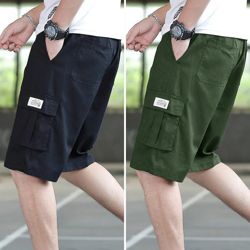 Man modelling loose fit khaki casual trousers with a giraffe pattern gradient detail.