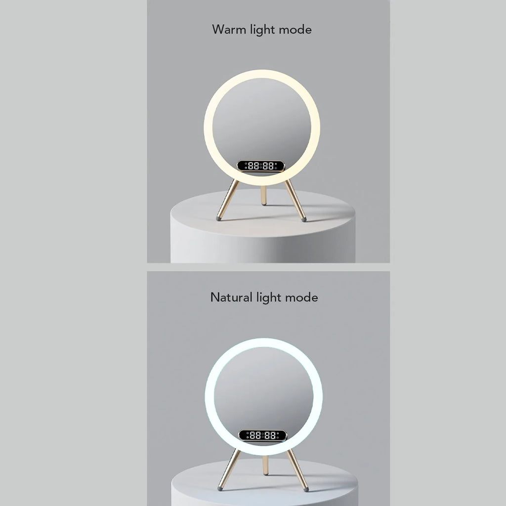 White multi-function LED mirror alarm clock with wireless charger and Bluetooth speaker on a table
