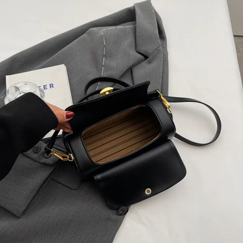 Personalised women's messenger shoulder bag with a letter detail in PU leather, shown in beige colour.