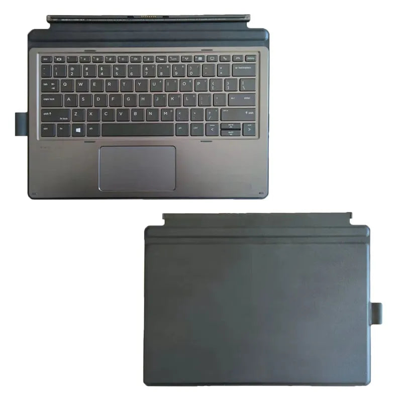 Elite X2 slim wireless keyboard with ergonomic design and multimedia keys next to a tablet.