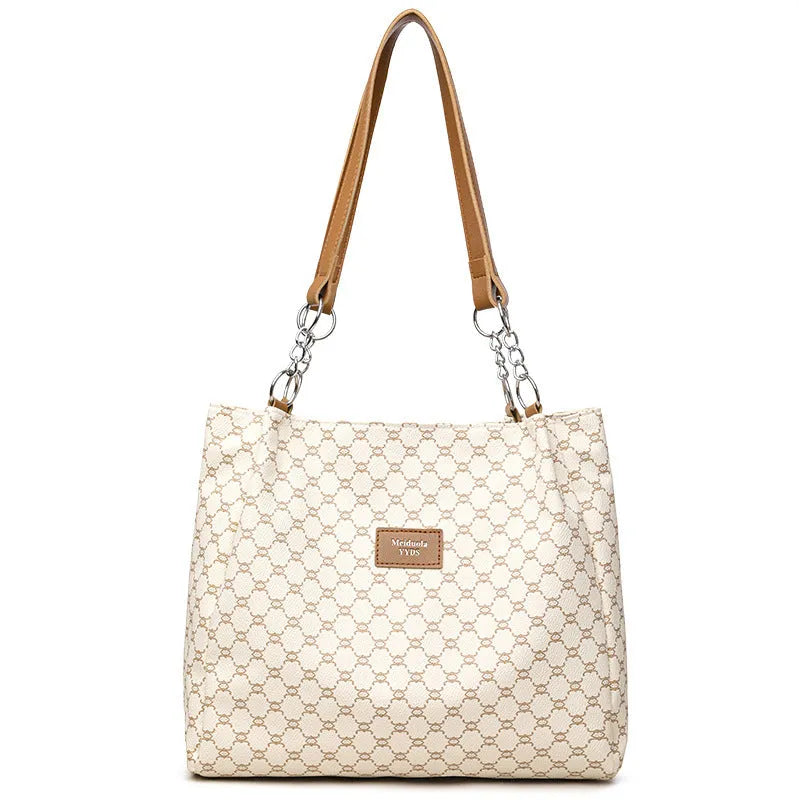 Retro women's handbag in soft brown PU leather with polyester lining.