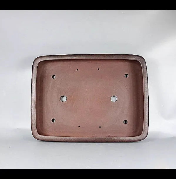 Handmade antique rectangular purple clay flower pot showing its size and natural colour.