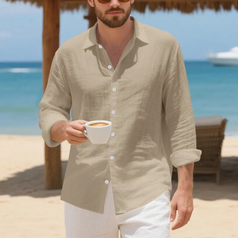 Man wearing a light blue loose-fit linen casual shirt with a button front and classic collar.
