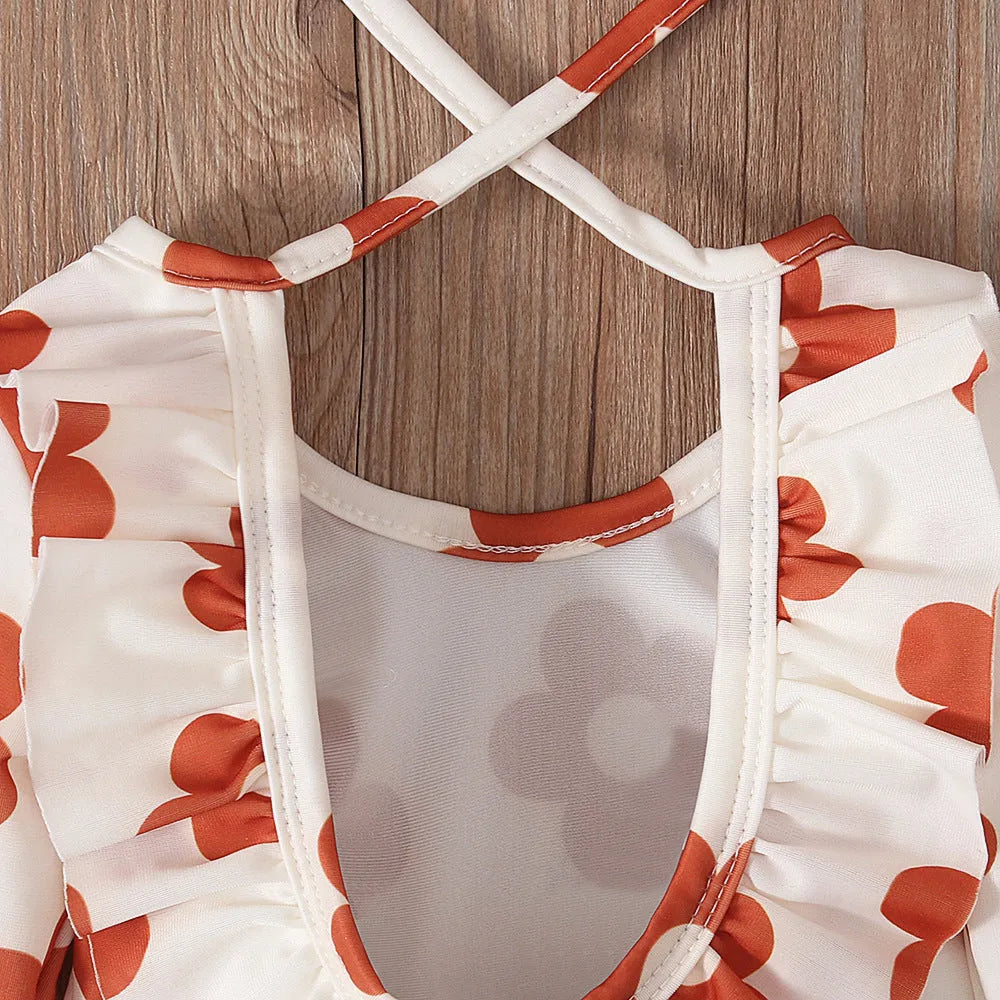Girl's white floral print open back swimsuit with crew neck design and high-cut briefs