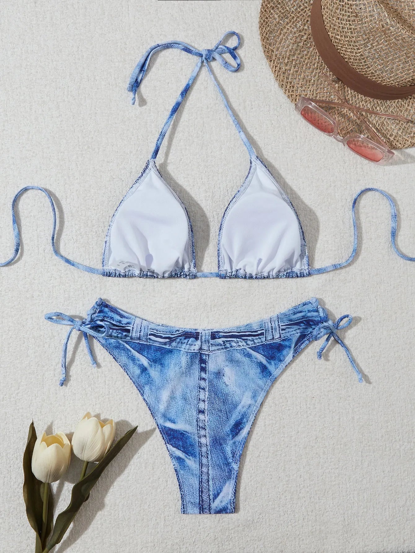Denim blue printed bikini top and bottom set for women on a mannequin.