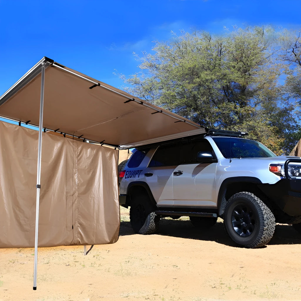 Black glue waterproof two-bedroom camping tent with aluminium poles set up outdoors.