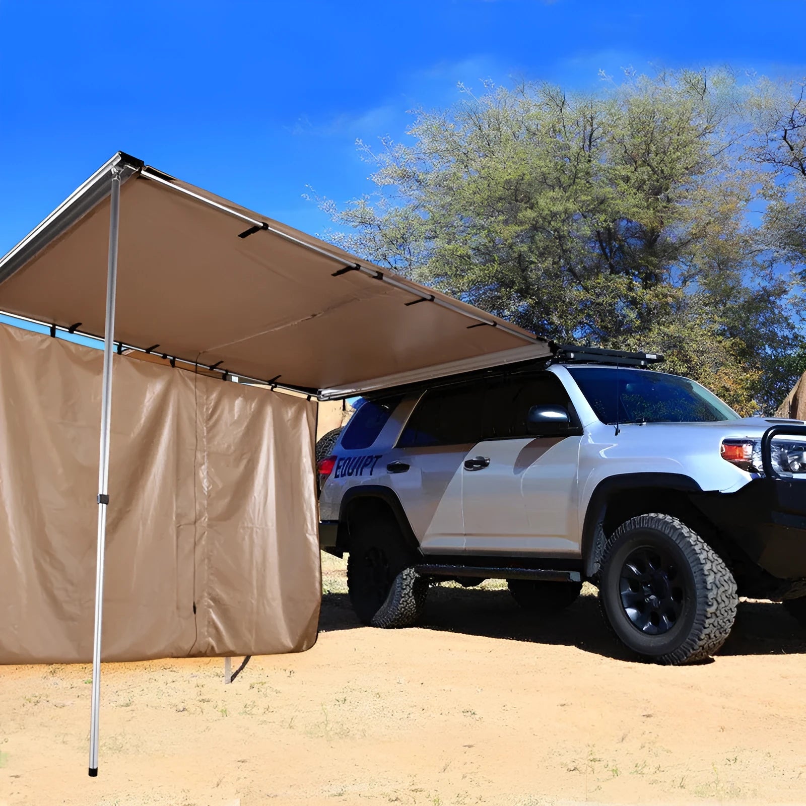 Black glue waterproof two-bedroom camping tent with aluminium poles set up outdoors.