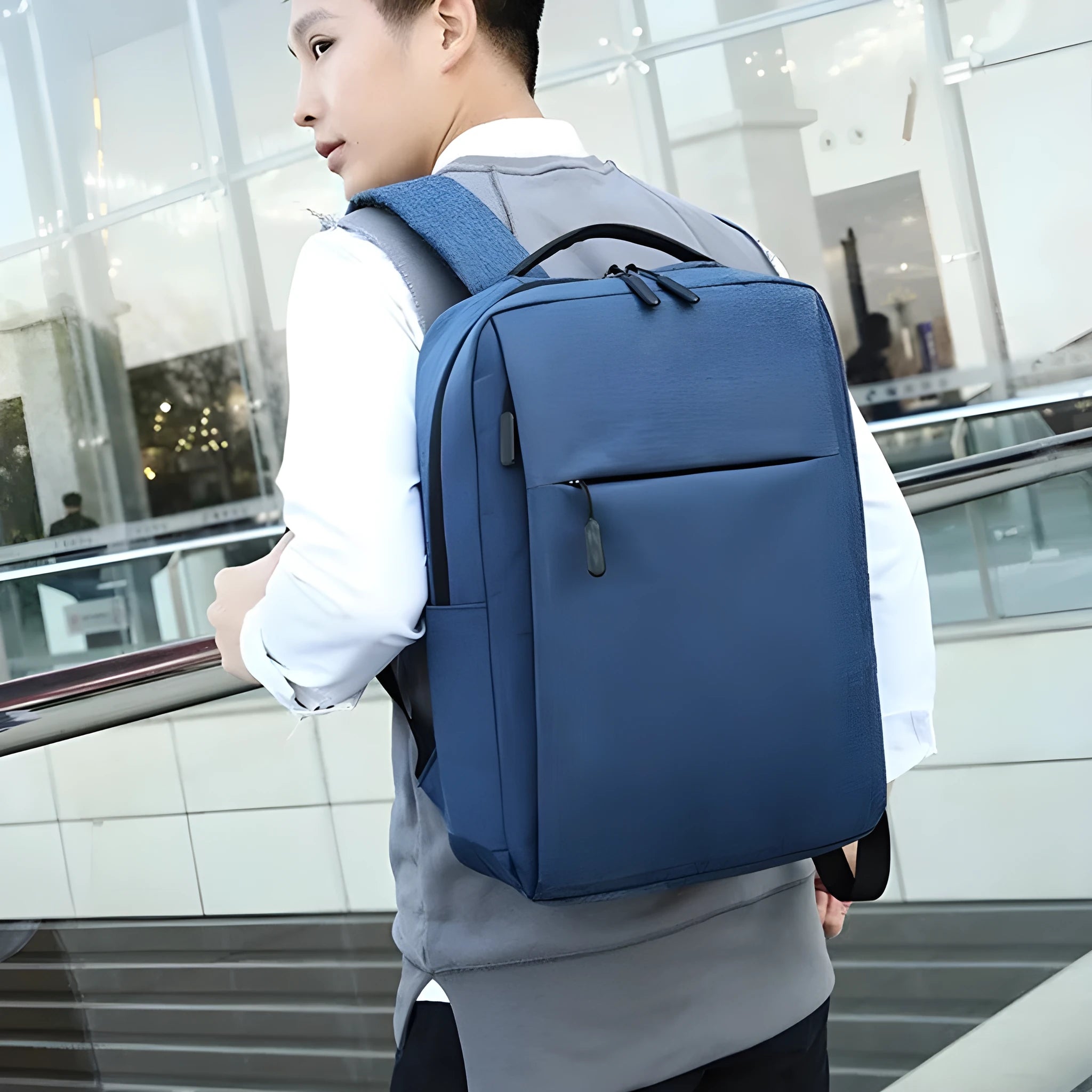 Large black Oxford cloth sports backpack with curved shoulder straps and USB charging port