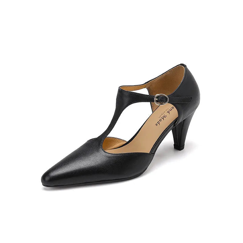 Brown retro women's T-strap sandals with a closed toe, block heel, and adjustable buckle.