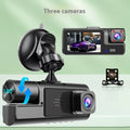 Black car dash cam with 2-inch screen mounted on windscreen, showing live reversing camera feed.