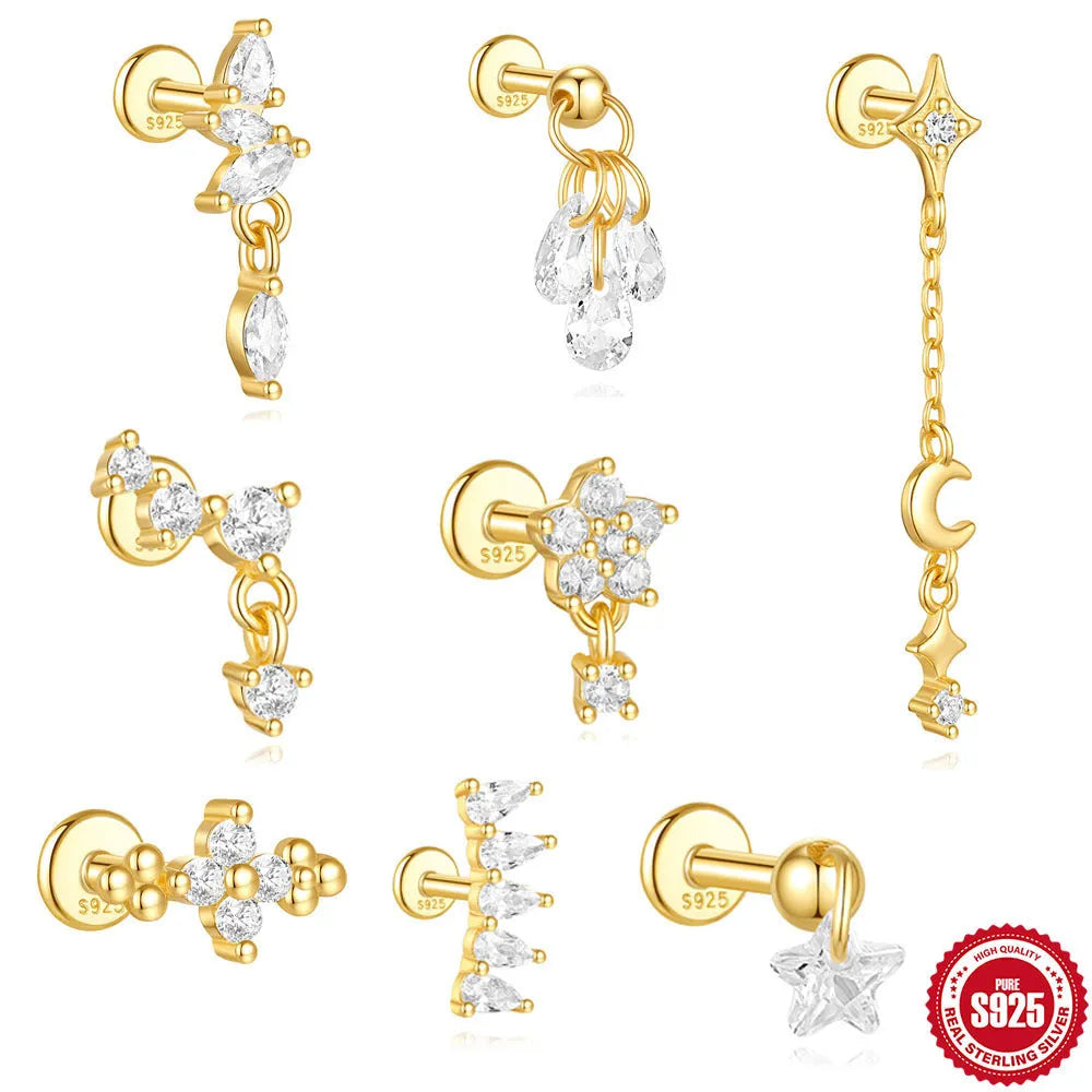 S925 sterling silver geometric moon and star earrings with diamond accents on a gold-coloured background.