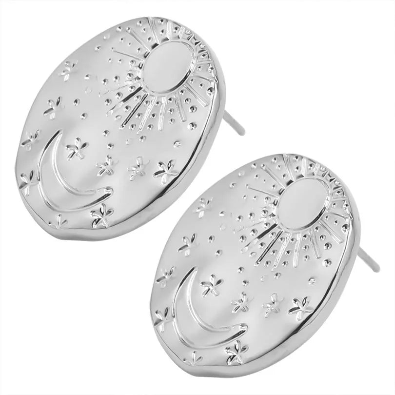 A pair of geometric shell design stud earrings in 304 stainless steel with a gold plated finish.