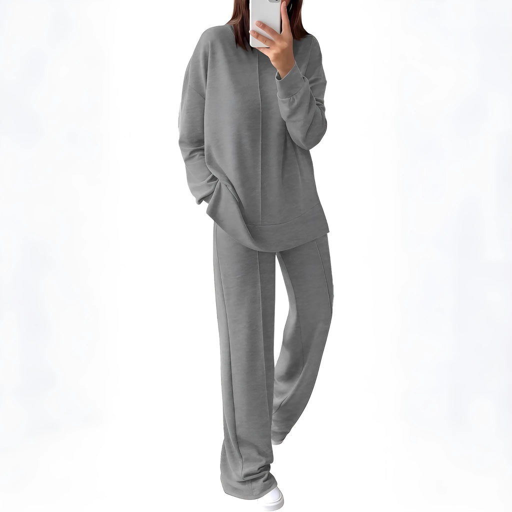 Women's long sleeve polyester jogging suit set shown in army green, available in five other colours.