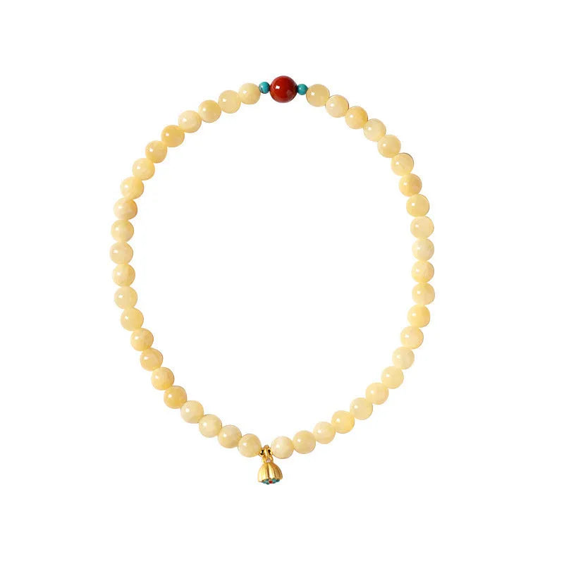 Handmade yellow jade double ring bracelet for women on a wrist, showing 6mm and 8mm size options.