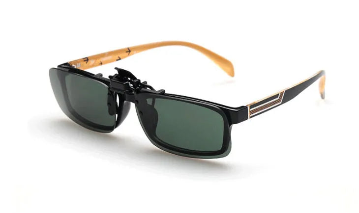 Clip-on sunglasses with polarised PC lenses attached to prescription glasses for driving