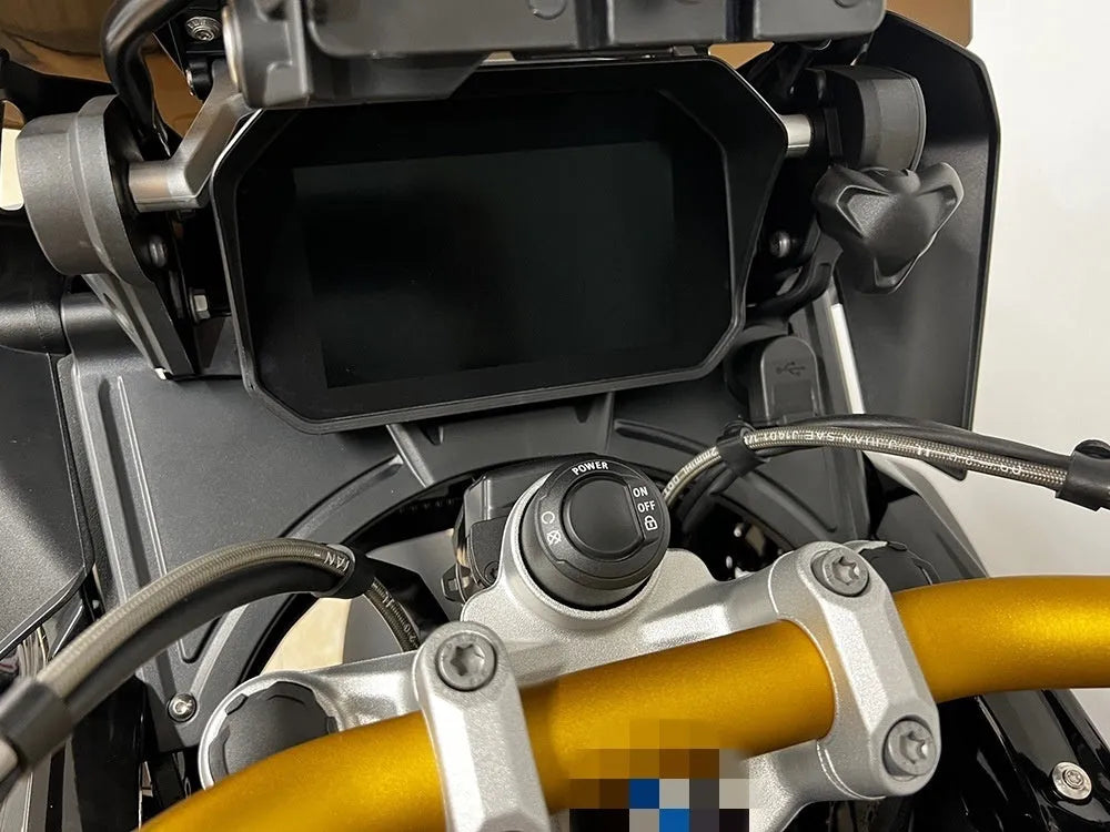 Matte black motorcycle cockpit fairing for BMW R1250GS and R1200GS models, showing mounting points.