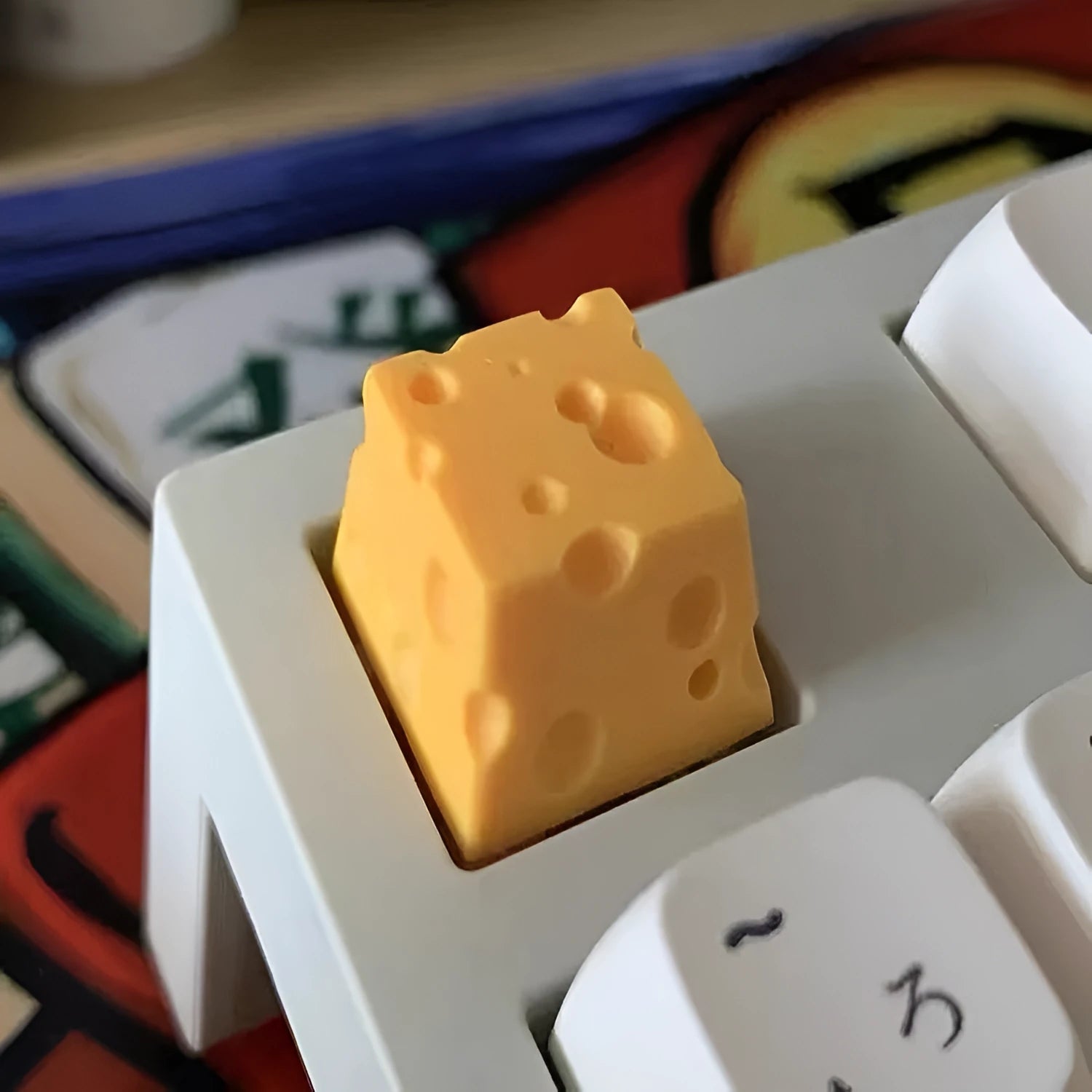 Yellow solid resin cheese wedge keycap for MX mechanical keyboards.