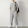 Long-sleeved waffle tracksuit set in nine colours, sizes L to 5XL, chemical fibre blend.