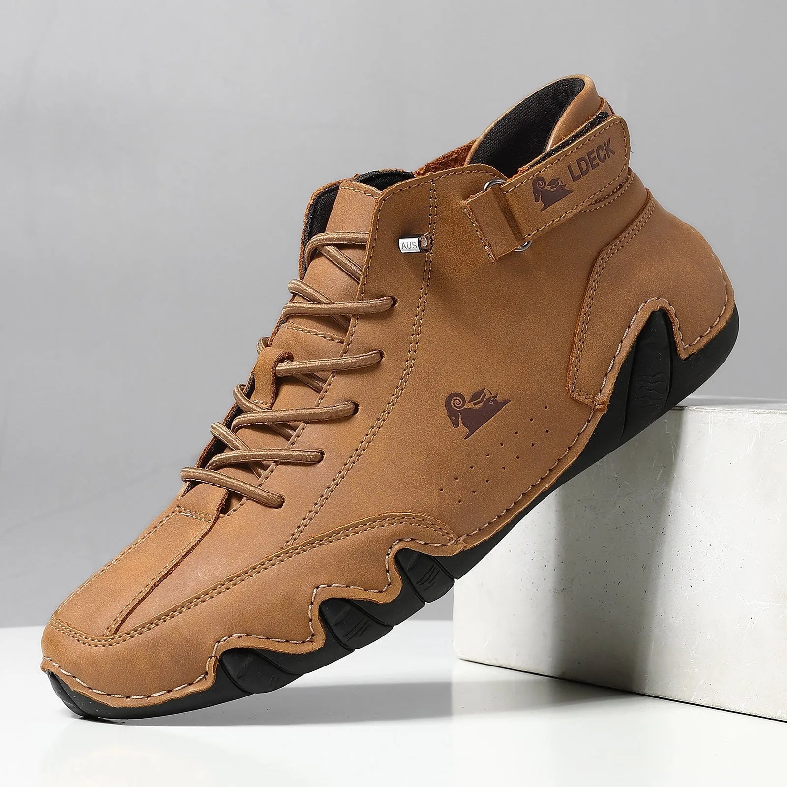 Men's khaki high-top ankle boots with a microfiber upper and rubber sole on a white background.