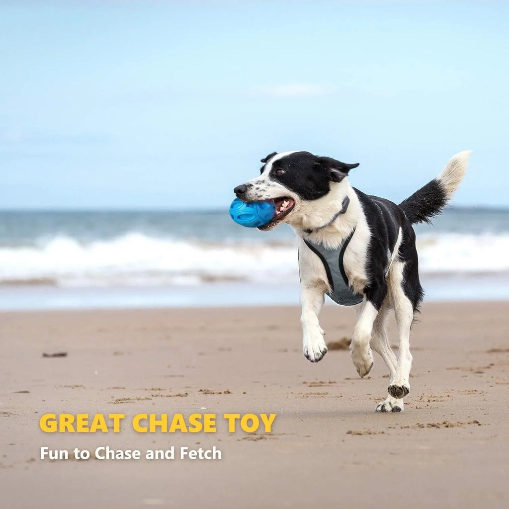 Blue, green, and orange natural rubber squeaky dog chew ball with grooved surface.