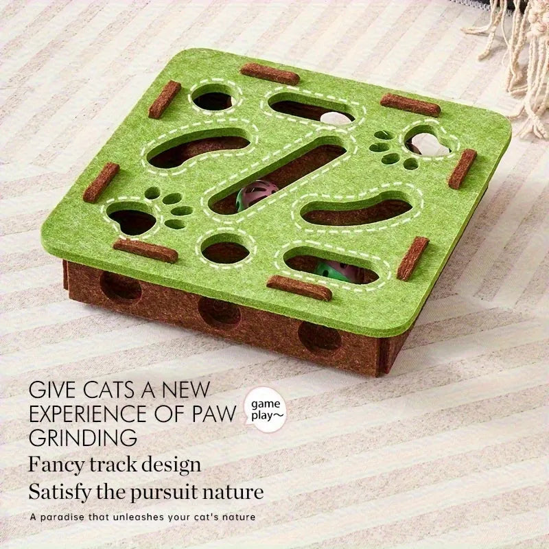 Interactive cat puzzle toy with felt maze tunnel and bell ball on a carpet