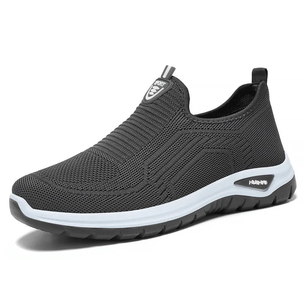 Men's black and grey breathable casual shoes with mesh lining, round toe, and PVC sole.