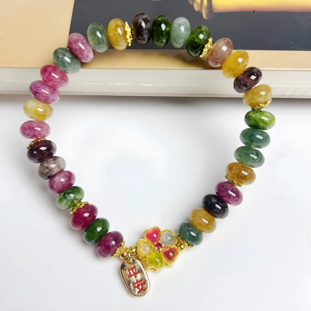 Women's bracelet with colourful tourmaline abacus beads and artificial crystal jade beads in hand-crafted design
