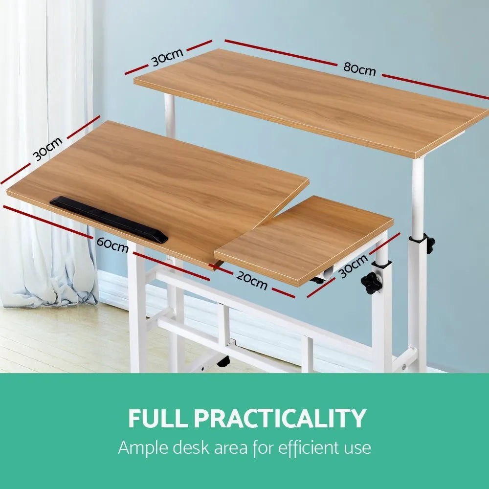 Mobile computer lifting foldable standing desk in walnut colour with plate material construction for bedroom or bedside use