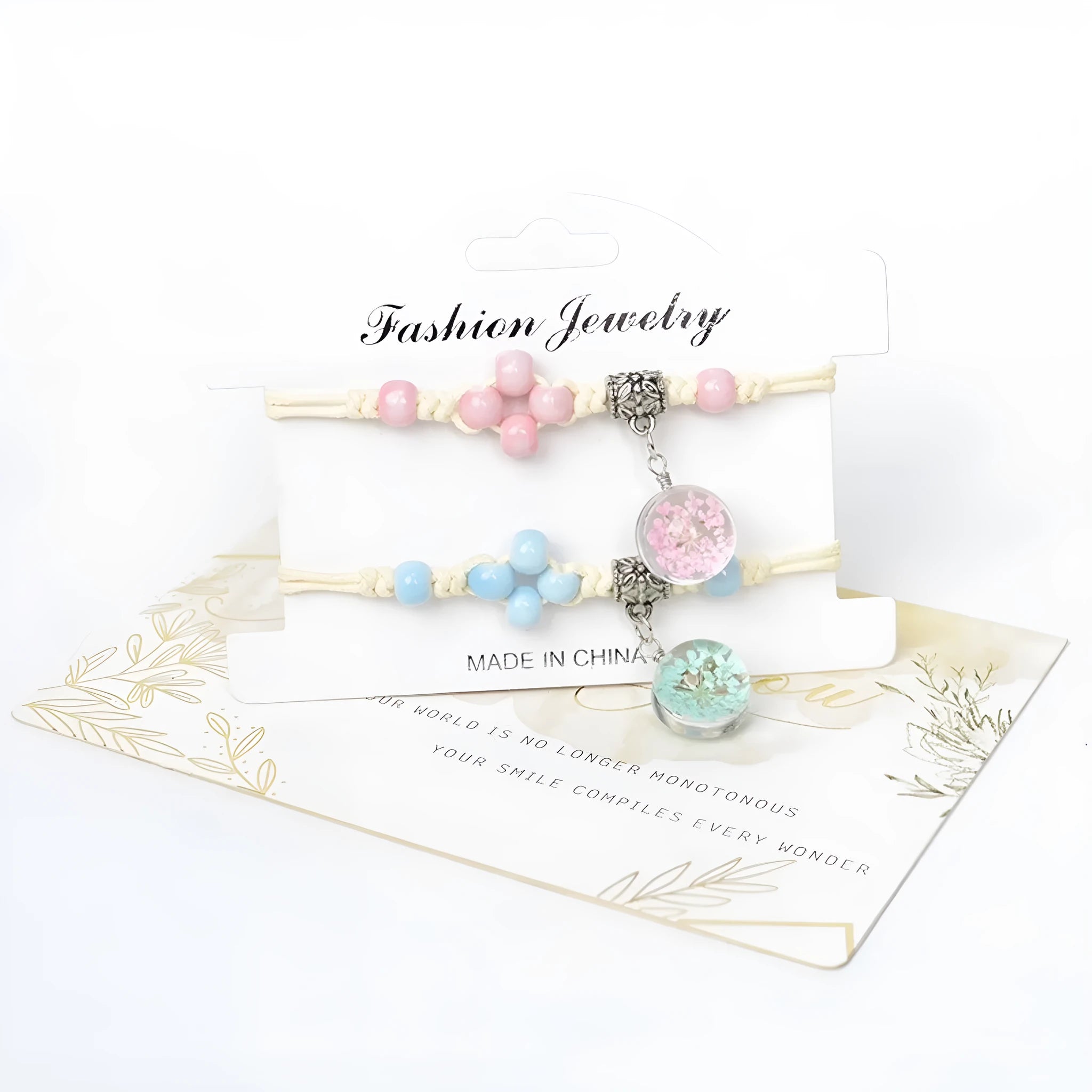 Close-up of a hand-woven glass bracelet with large 1.4cm beads containing real dried flowers.