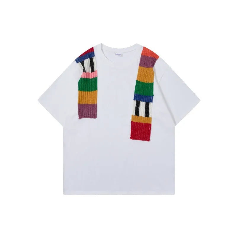 Cotton pullover top with colour contrast patchwork design showing letter patterns, loose fit with short sleeves
