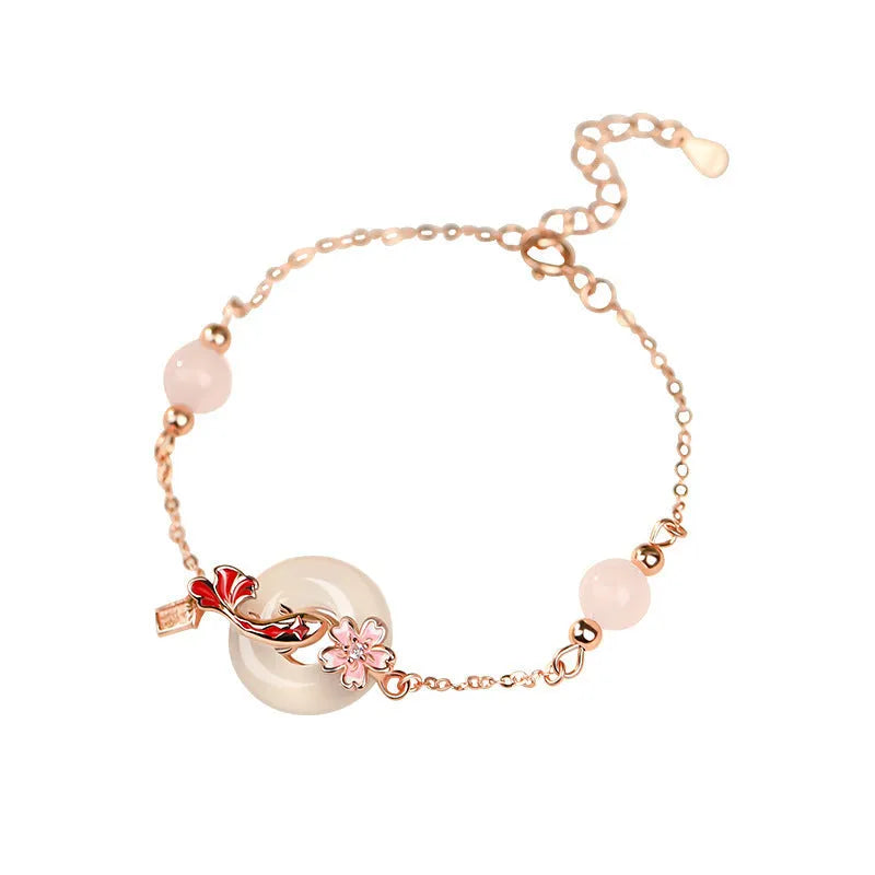 S925 sterling silver bracelet with white chalcedony crystals on a wrist