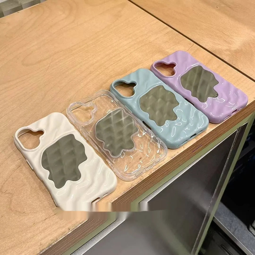 Beige iPhone case with a water ripple texture and a mirrored strip on the back.