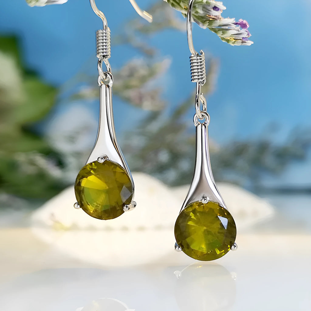 Olive green topaz colour earrings with water drop shape and retro style design