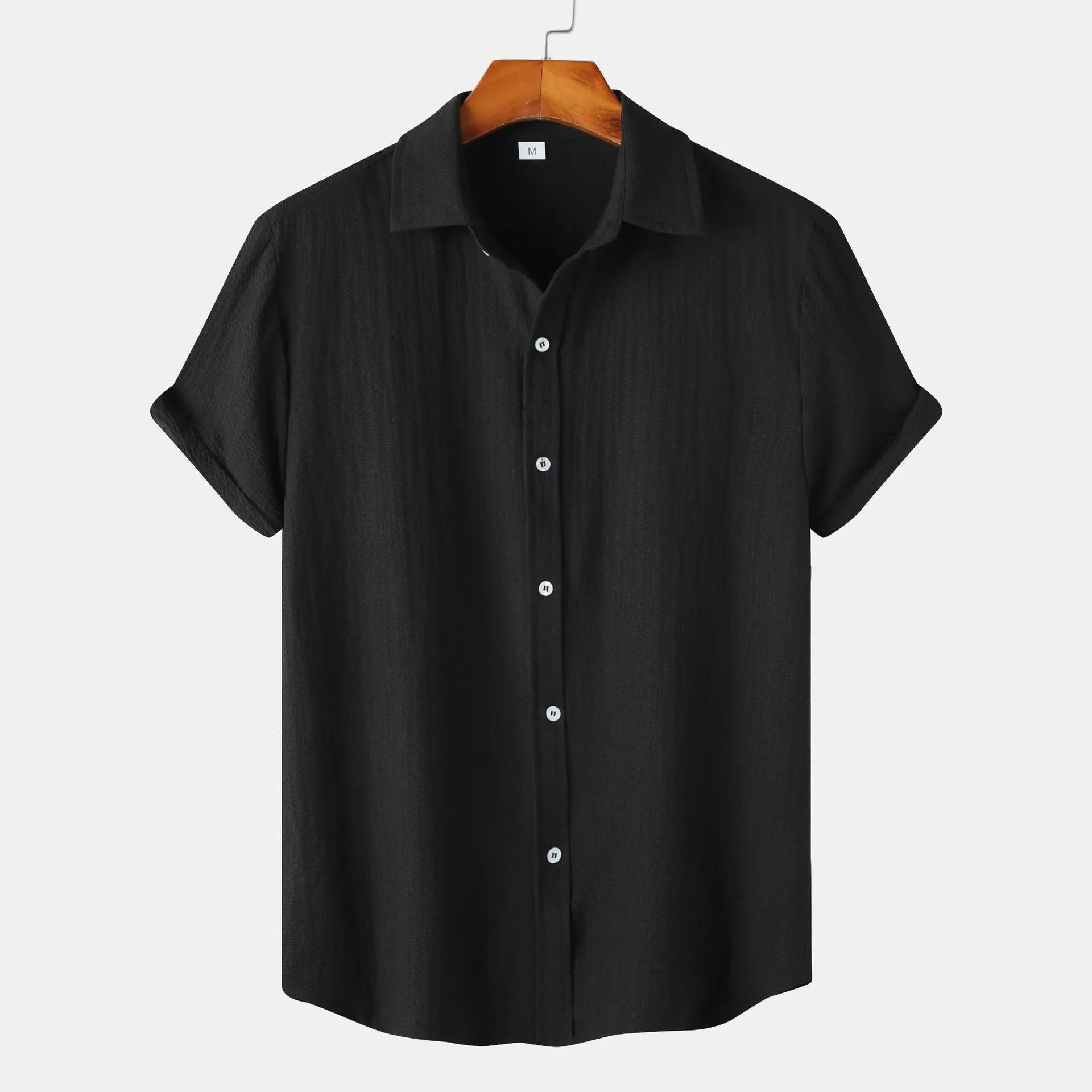 Casual short-sleeved men's cardigan-style shirt in polyester, shown in available colours.