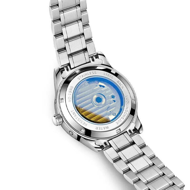 Men's silver stainless steel mechanical watch with white dial and brown leather strap.
