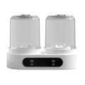 White double-bucket mini USB washing machine with two lids and a USB cable on a countertop.