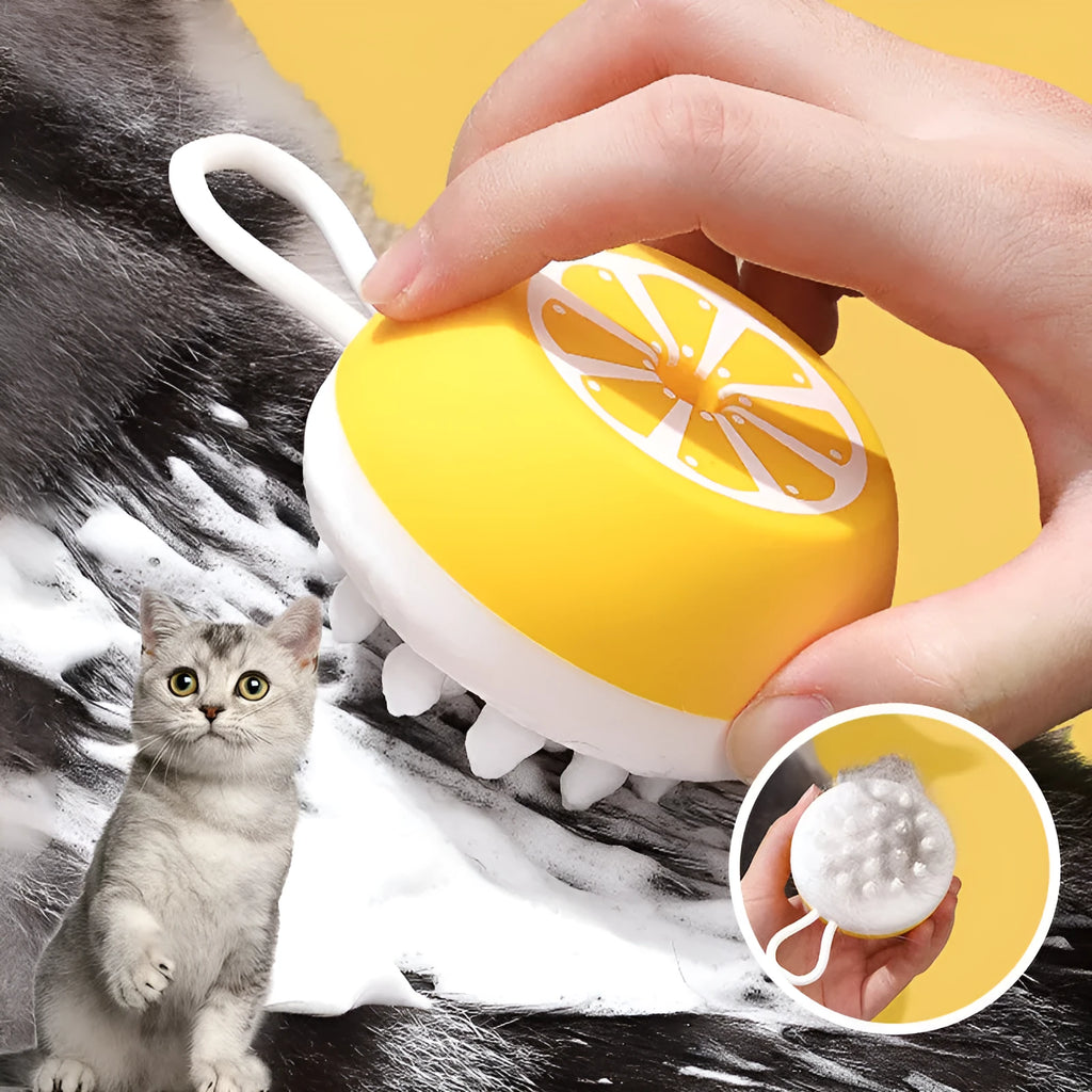 Yellow silicone pet bath brush showing massage head and comb sides on a 102mm scale.