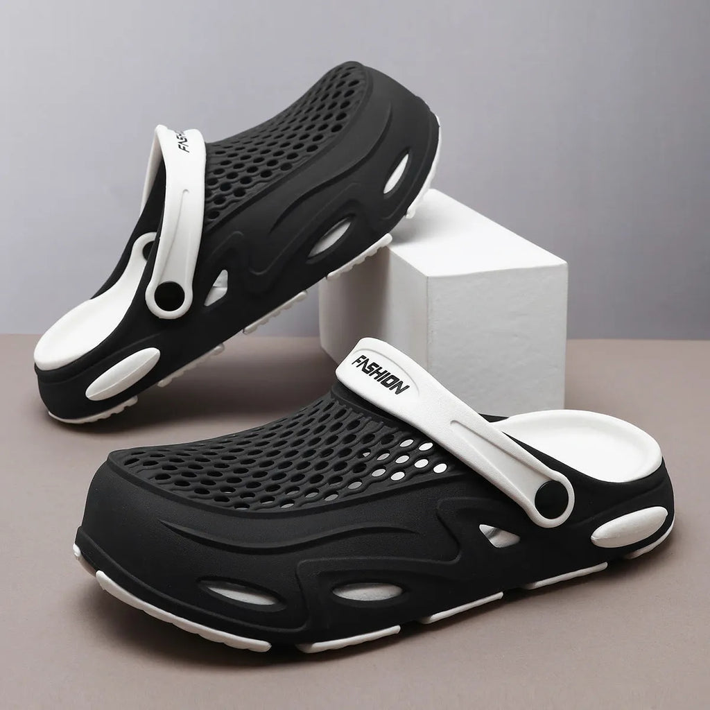 Men's closed toe beach slippers in gray colour showing grid pattern EVA construction with round toe design