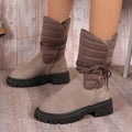 Women's black suede chunky heel snow boots with lace-up front and fleece lining.