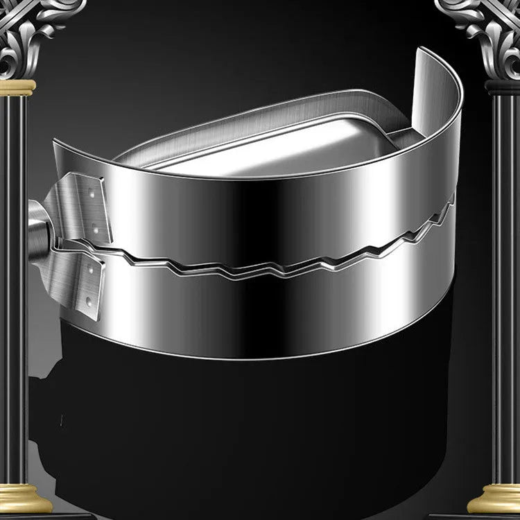 Silver stainless steel manual dumpling maker press tool on a kitchen surface.