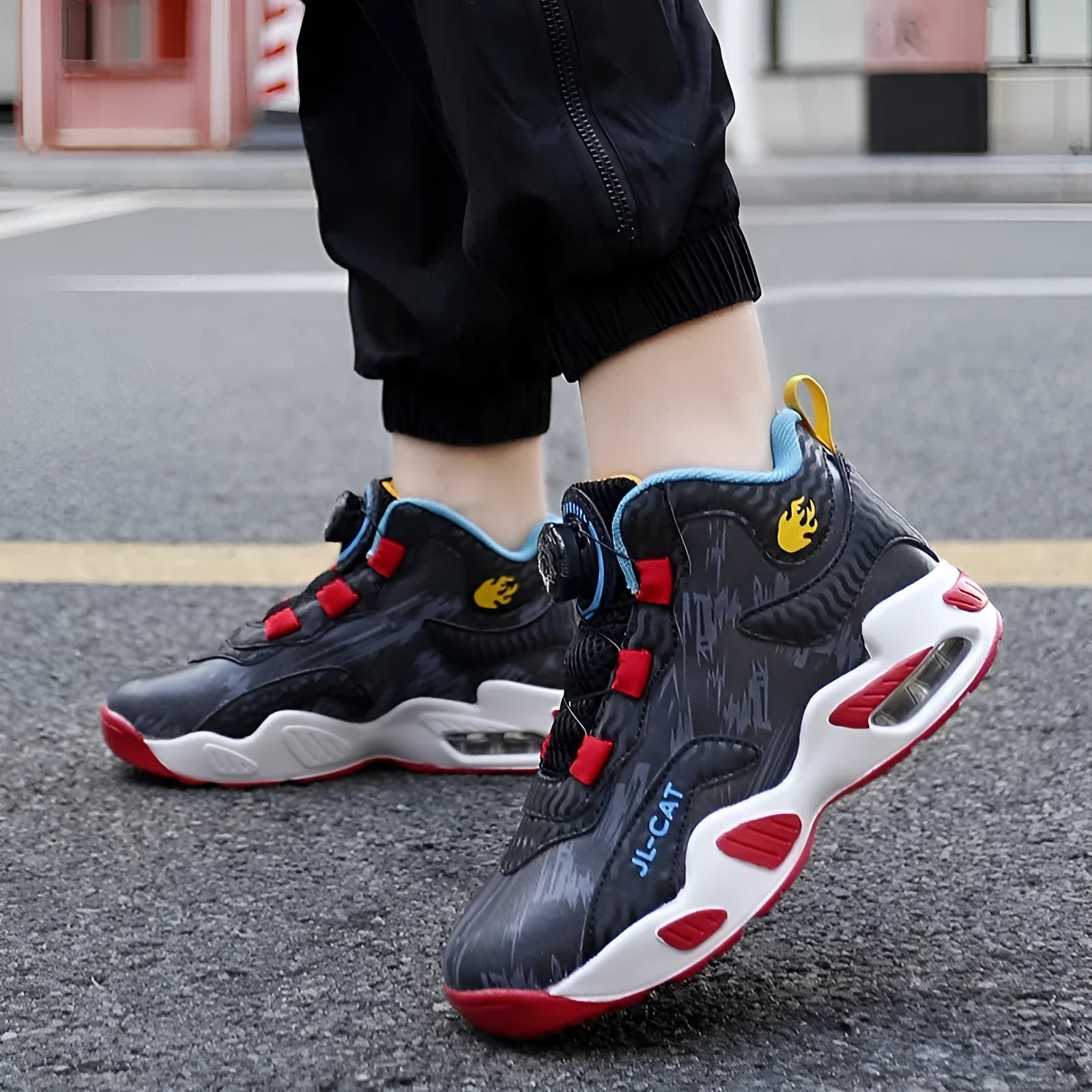 Children's rotating button basketball shoes in synthetic leather, showing waterproof design and colour options.