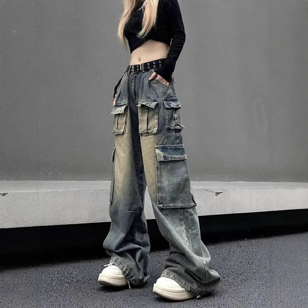 Men's light blue loose-fit distressed denim jeans with multiple pockets and straight-leg cut