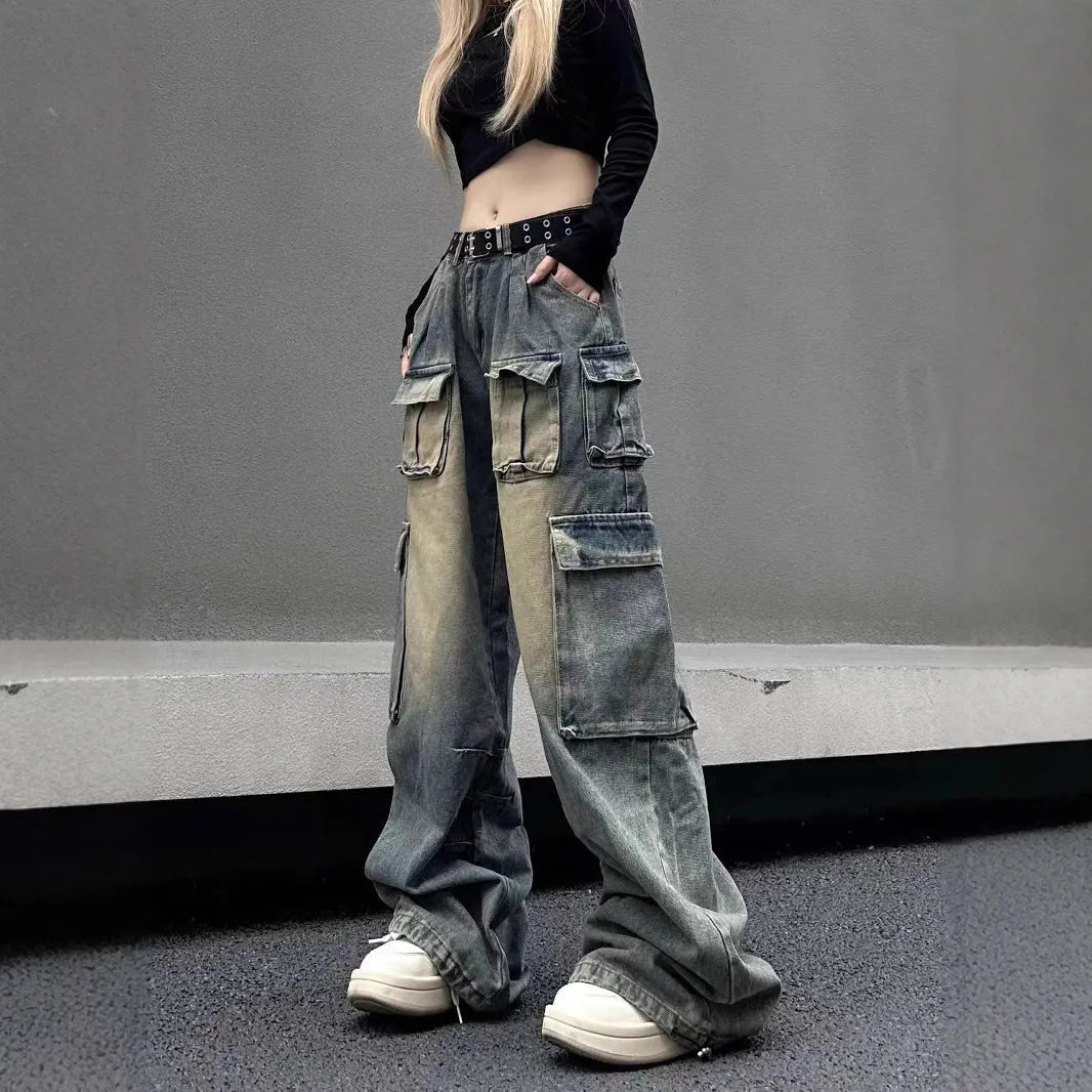 Men's light blue loose-fit distressed denim jeans with multiple pockets and straight-leg cut