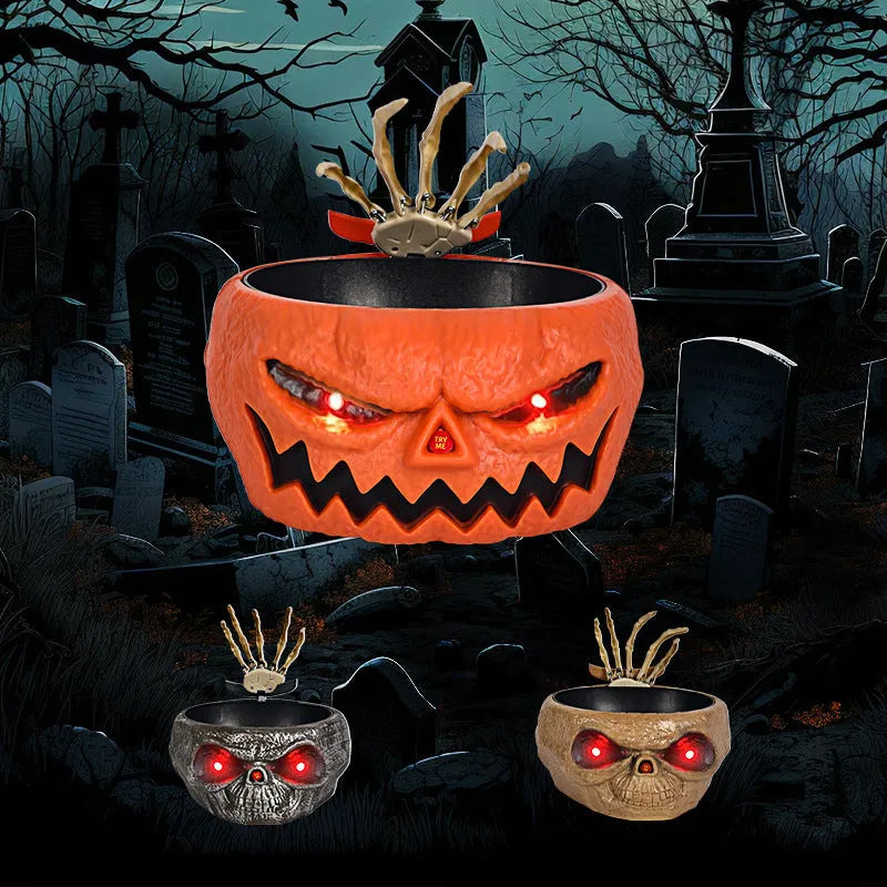 Motion activated Halloween candy bowl plastic pumpkin shape with skeleton hand and glowing red eyes