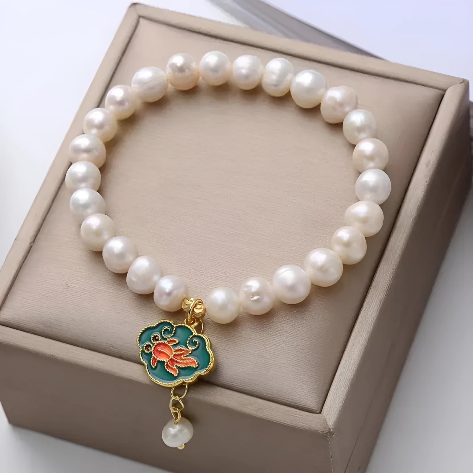 White freshwater pearl bracelet with goldfish pendant and lotus design in vintage baroque style